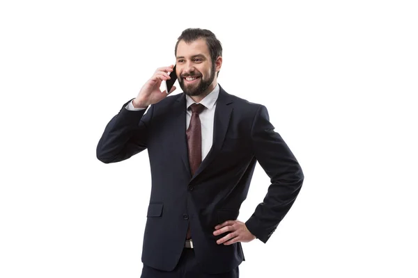 Businessman talking on smartphone — Stock Photo, Image