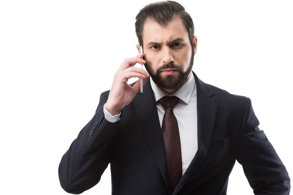 Businessman talking on smartphone — Stock Photo, Image
