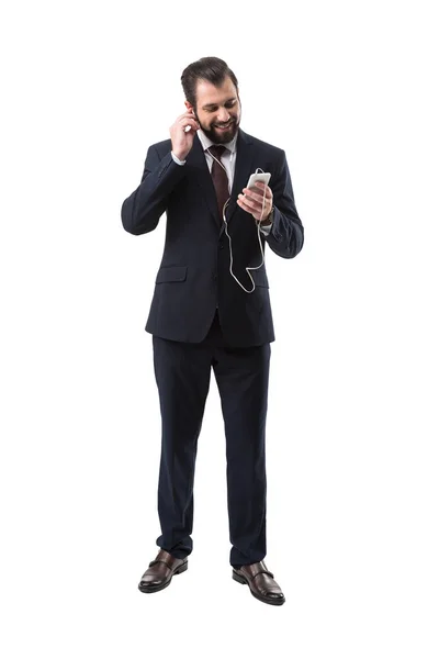 Empresario escuchando música — Foto de stock gratis