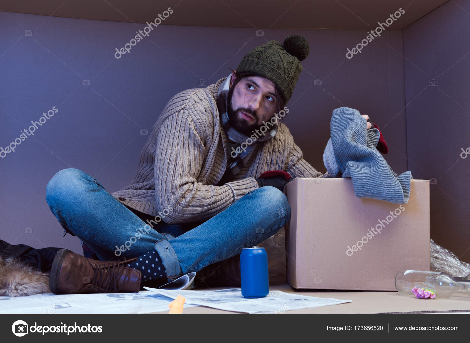 Homeless man with clothes — Free Stock Photo © VitalikRadko 173656520