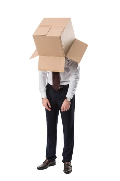 Uomo d'affari esausto con scatola sulla testa — Foto Stock