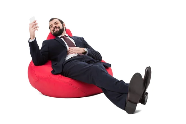 Businessman using smartphone — Stock Photo, Image