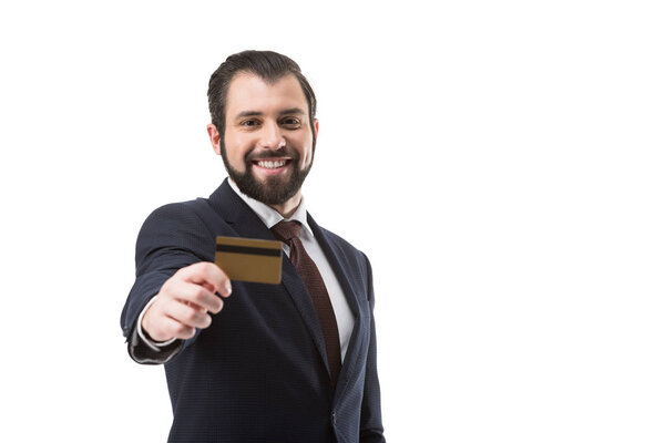 cheerful businessman with credit card