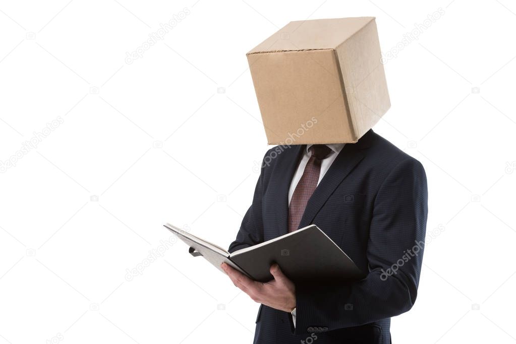businessman with folder and box on head  