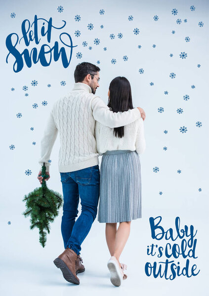 Пара с рождественской ёлкой
