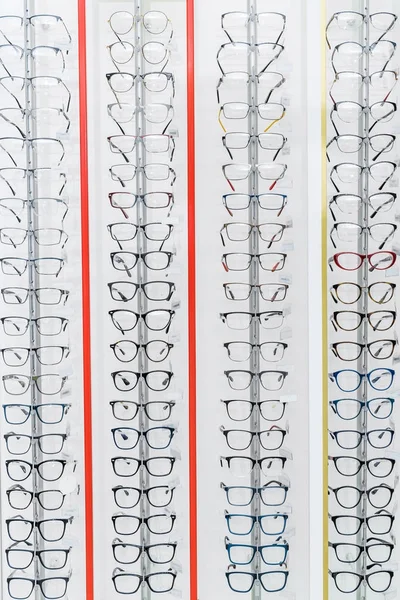 Background Different Glasses Shelves Optics — Stock Photo, Image