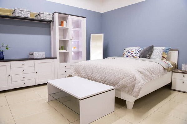 cozy modern bedroom interior with bed