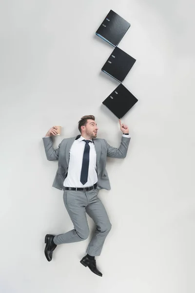 Overhead View Businessman Coffee Holding Stack Folders One Finger Isolated — Stock Photo, Image