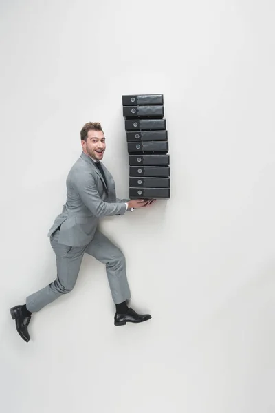 Overhead View Young Businessman Carrying Stack Folders Isolated Grey — Stock Photo, Image