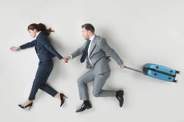 Overhead View Business Coworkers Suitcase Holding Hands Isolated Grey — Stock Photo, Image