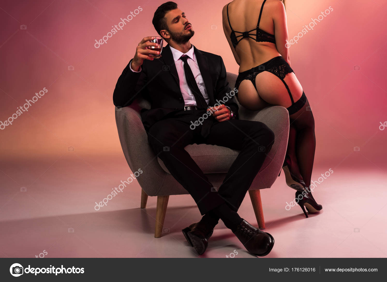 Handsome Businessman Sitting Armchair Sexy Girl Lingerie Stock Photo by ©VitalikRadko 176126016