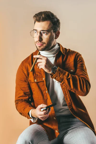 Pensive Stylish Man Cigar Hand Looking Away Isolated Beige — Free Stock Photo