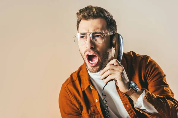 Portrait Stylish Man Screaming While Talking Telephone Isolated Beige — Stock Photo, Image