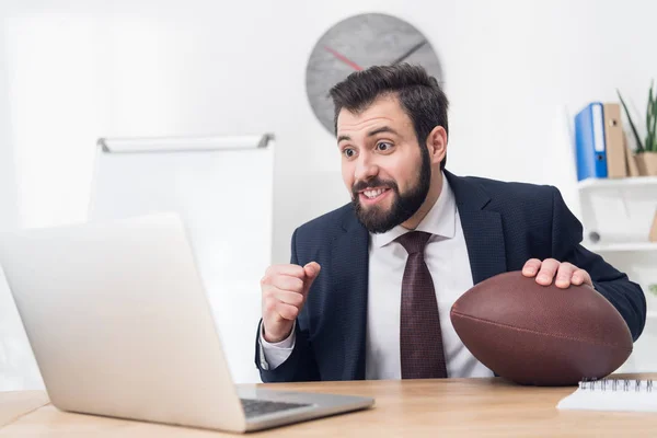 Portrait Businessman Rugby Ball Workplace Laptop Office — Free Stock Photo