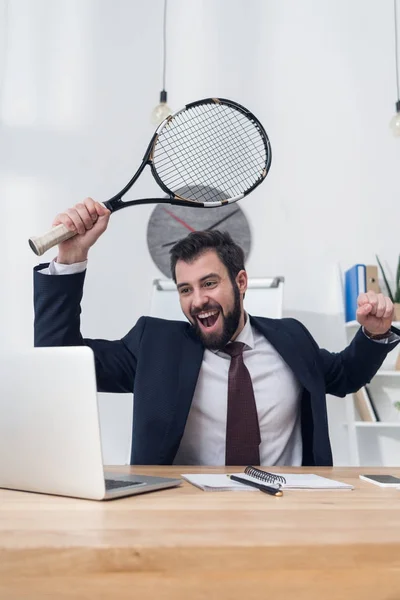 Portrait Excited Businessman Suit Tennis Racket Workplace — Free Stock Photo