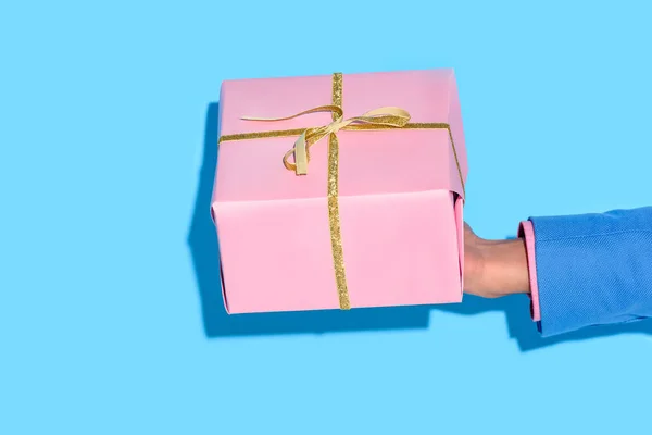 Partial View African American Man Holding Wrapped Gift Blue Wall — Stock Photo, Image