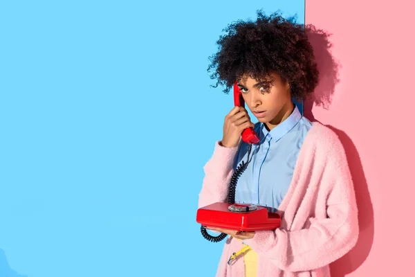 Portrait African American Woman Talking Retro Telephone Pink Blue Wall — Stock Photo, Image