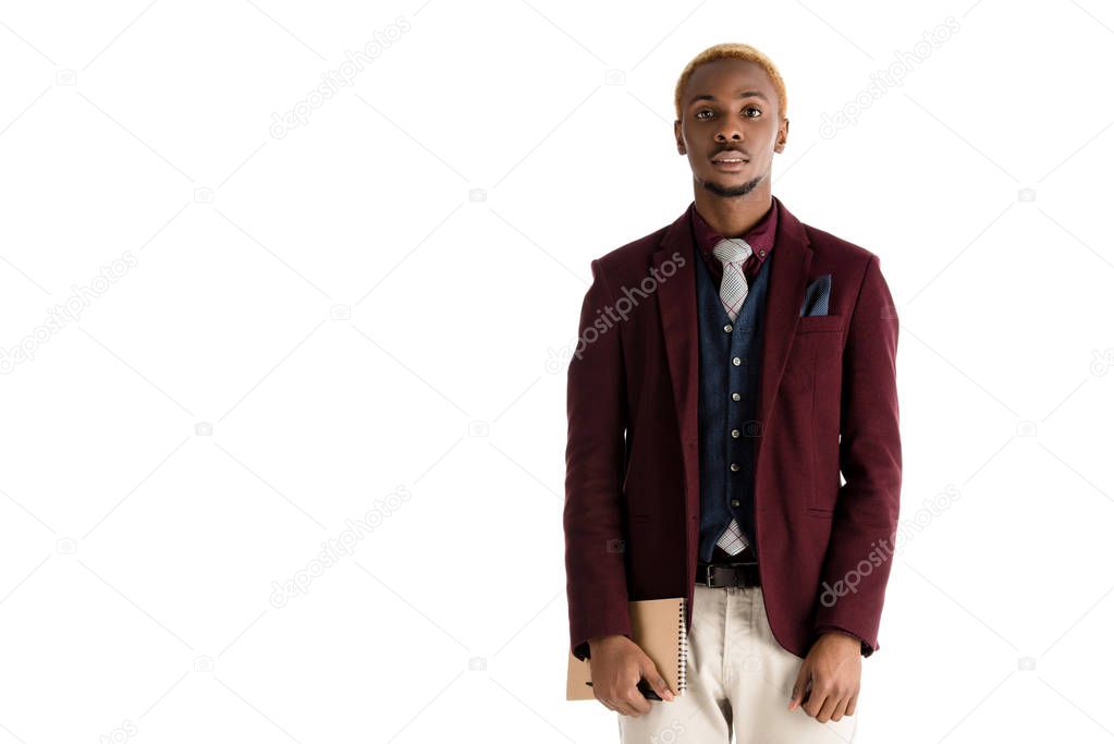 African man in jacket with notebook in hand isolated on white 