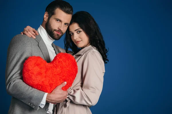 Attractive Couple Holding Heart Shaped Pillow Isolated Blue — Stock Photo, Image