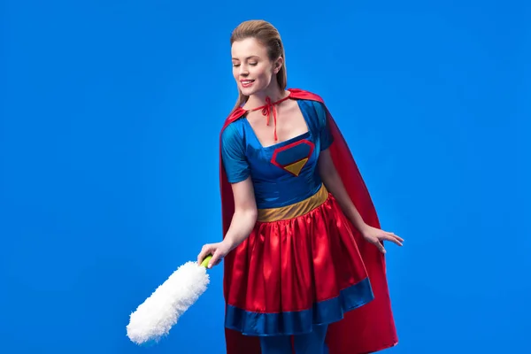 Portrait Woman Superhero Costume Dust Cleaning Brush Isolated Blue — Free Stock Photo