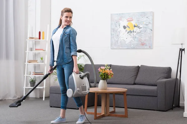 Smiling Woman Vacuum Cleaner Hands Looking Away — Stock Photo, Image