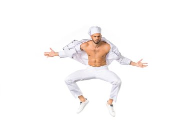 handsome young bare chested chef jumping and looking at camera isolated on white  clipart