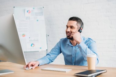 happy adult call center worker working at office clipart