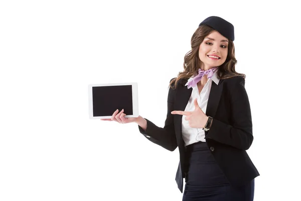 Aeromoça Atraente Apontando Tablet Com Tela Branco Isolada Branco — Fotografia de Stock