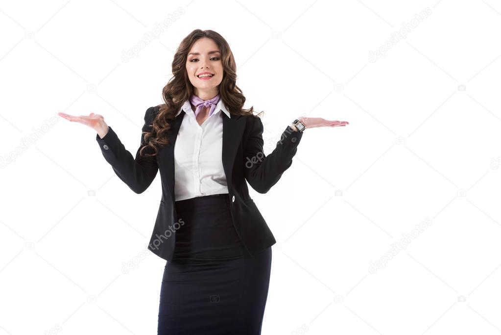 attractive stewardess showing something with hands isolated on white