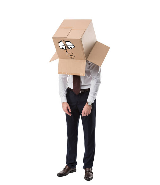 exhausted businessman with cardboard box on head standing isolated on white 