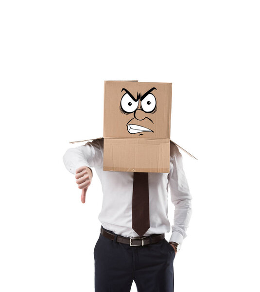 angry businessman with cardboard box on his head showing thumb down isolated on white