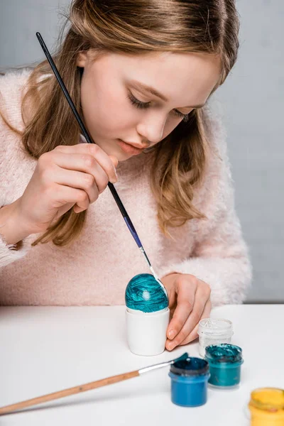 Adorable Focused Girl Painting Easter Egg — Free Stock Photo