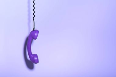 hanging purple phone handset, ultra violet trend clipart