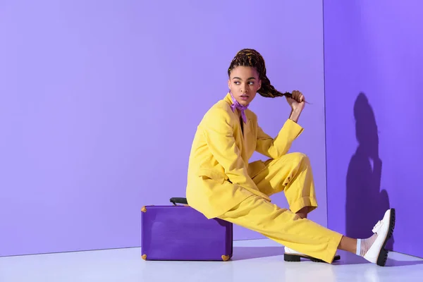 African American Girl Posing Yellow Suit Sitting Purple Suitcase Trendy — Stock Photo, Image