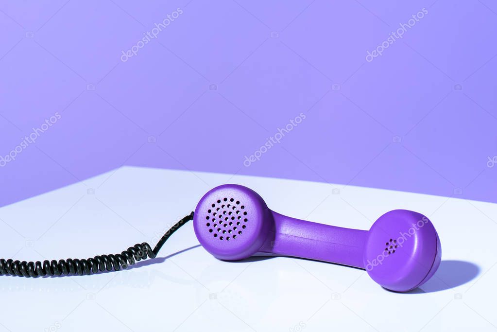 plastic purple telephone handset, ultra violet trend