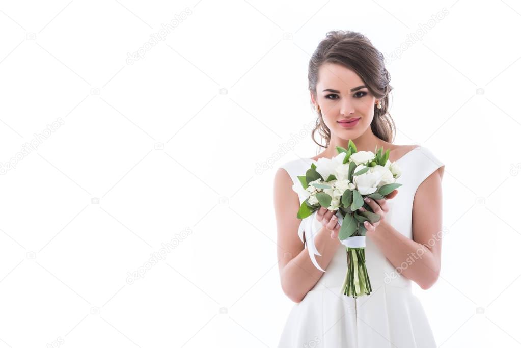 brunette bride posing with wedding bouquet, isolated on white