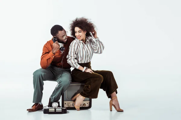 Happy African American Retro Styled Couple Sitting Vintage Television Phone — Stock Photo, Image