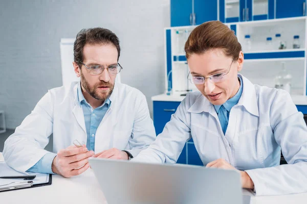 Portrait Scientists Lab Coats Eyeglasses Working Laptop Together Workplace Lab — Stock Photo, Image