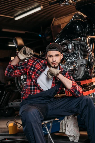 Attractive Bike Repair Station Worker Wrench Sitting Front Motorcycle — Stock Photo, Image