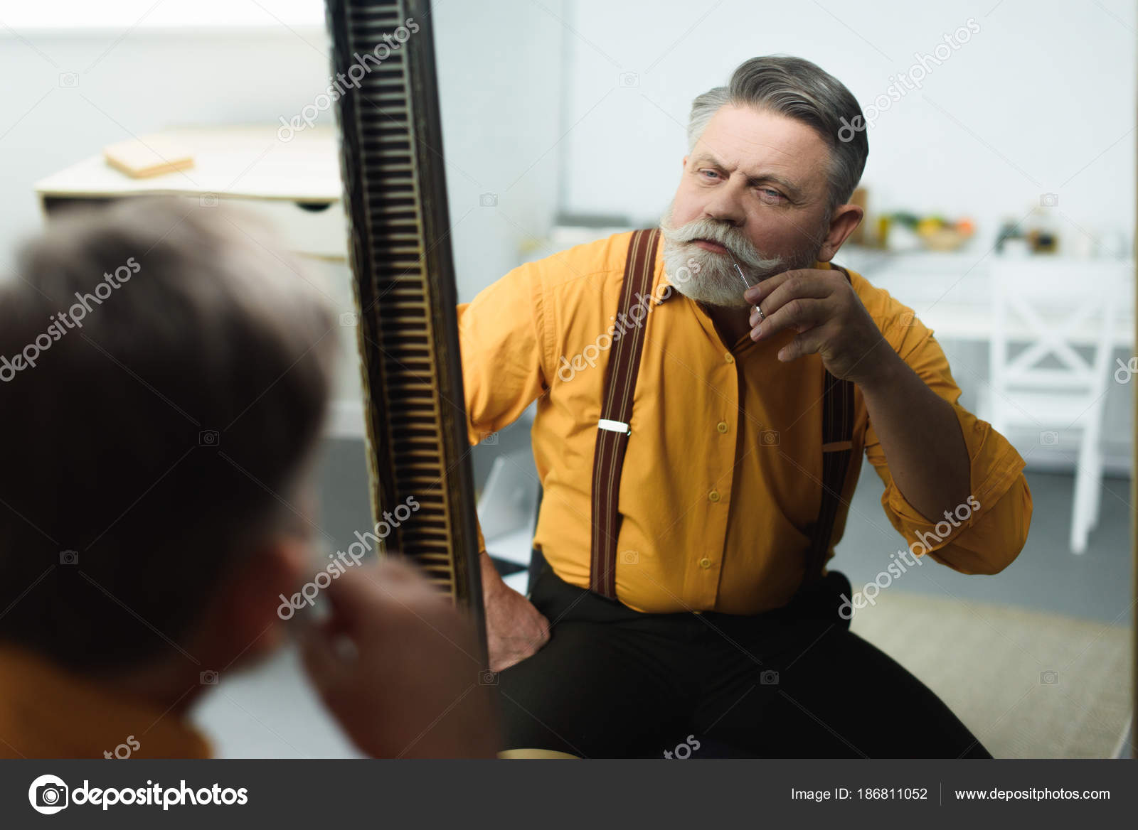 Handsome Bearded Senior Man Trimming Moustache Scissors Looking Mirror