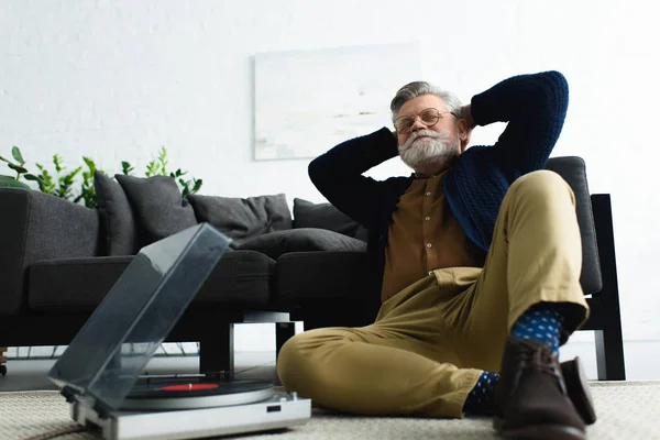 Relaxed Stylish Man Eyeglasses Sitting Hands Head Listening Music Vinyl — Stock Photo, Image