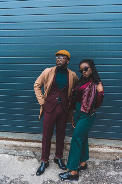 full length view of fashionable african american couple posing together on street 