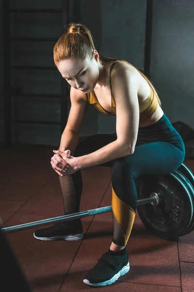 Frustrated Young Sportswoman Sitting Barbell Gym — Stock Photo, Image