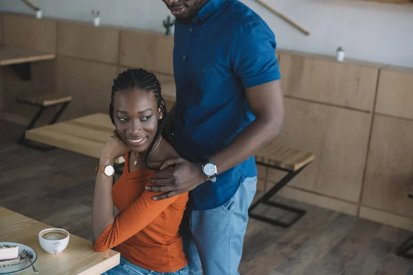 Partial View African American Man Hugging Smiling Girlfriend Romantic Date — Free Stock Photo