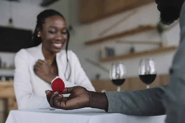 Partial View African American Man Proposing Girlfriend Romantic Date Restaurant — Stock Photo, Image