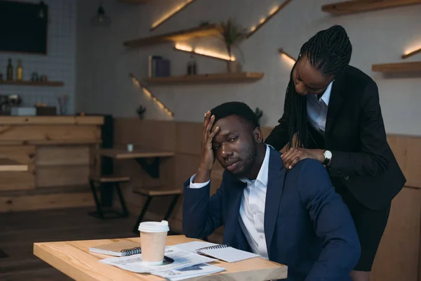 Stressed African American Businessman Colleague Doing Massage Meeting Cafe — Stock Photo, Image