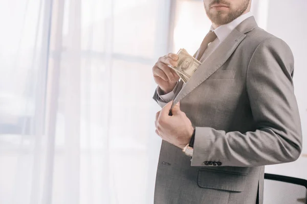 Cropped Shot Businessman Suit Putting Dollar Banknotes Pocket Office — Stock Photo, Image