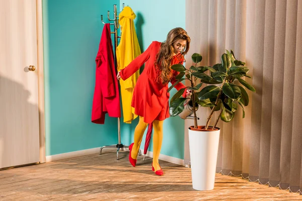 Old Fashioned Girl Red Dress Watering Plant Watering Can Home — Free Stock Photo