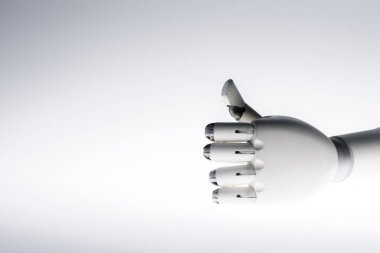 robot hand showing thumb up isolated on grey clipart