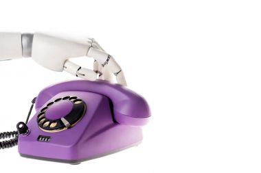 robot el ultra violet retro sabit telefon üzerinde beyaz izole dokunmadan
